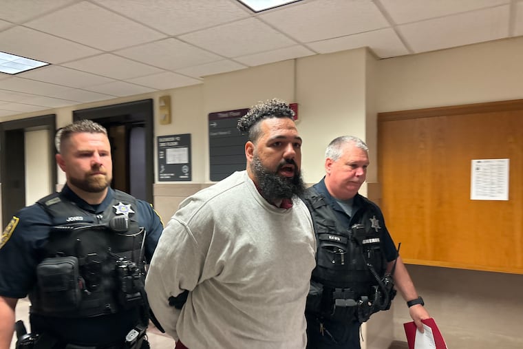 Matthew Santiago is escorted into a courtroom in the Montgomery County Courthouse on Thursday. Santiago was sentenced to two to five years in state prison for, prosecutors say, buying drugs that later killed his girlfriend's 6-year-old son.
