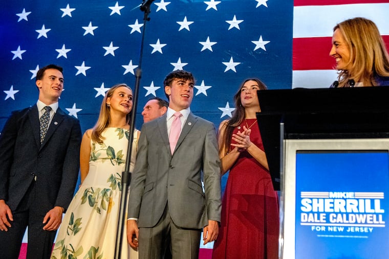 New Jersey Governor-elect Mikie Sherrill turns to her family during her victory speech at an election night party in East Brunswick Tuesday.