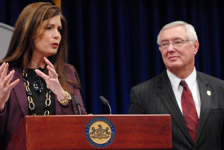 Pa. Attorney General Kathleen Kane and State Police Commissioner Frank Noonan announce the charges.