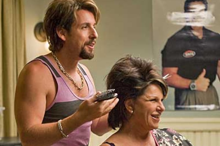 One-time counter-terrorist turned hairstylist Zohan (Adam Sandler) practices his technique with Gail (Lainie Kazan.)