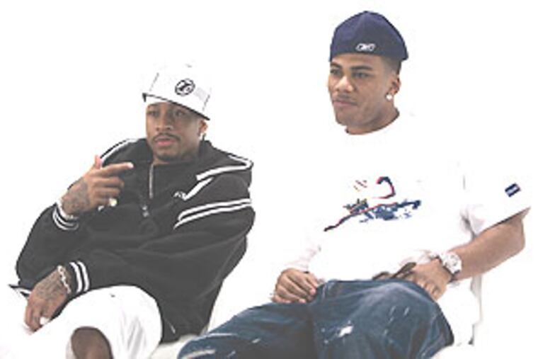 Allen Iverson (left) with Nelly, who conducts the interview with the former Sixer.