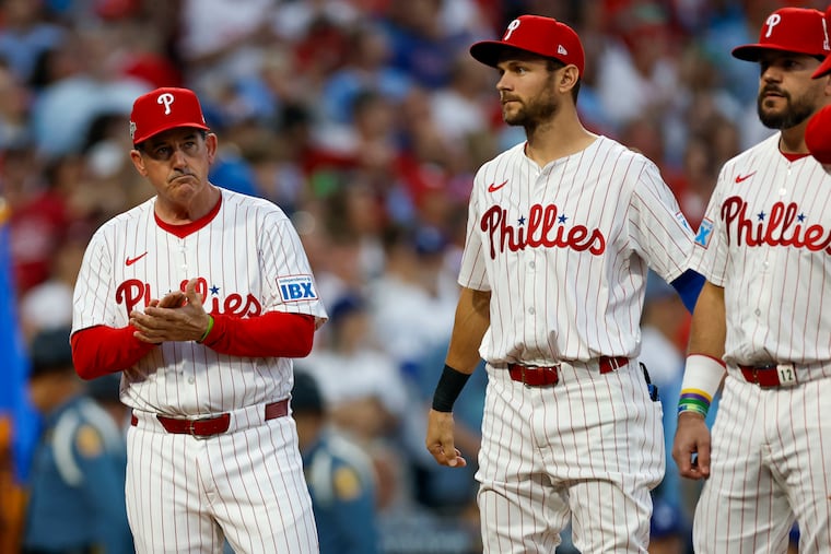 Phillies manager Rob Thompson next to shortstop Trea Turner before the start of Game 1 of the NLDS against the Dodgers on Oct. 4, 2025, in Philadelphia.