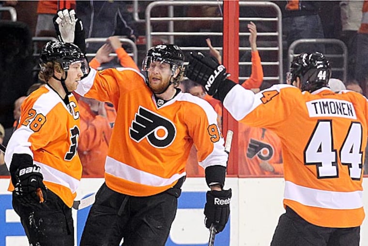 The Flyers' Jakub Voracek celebrates his goal with teammates Claude Giroux and Kimmo Timonen. (Yong Kim/Staff Photographer)
