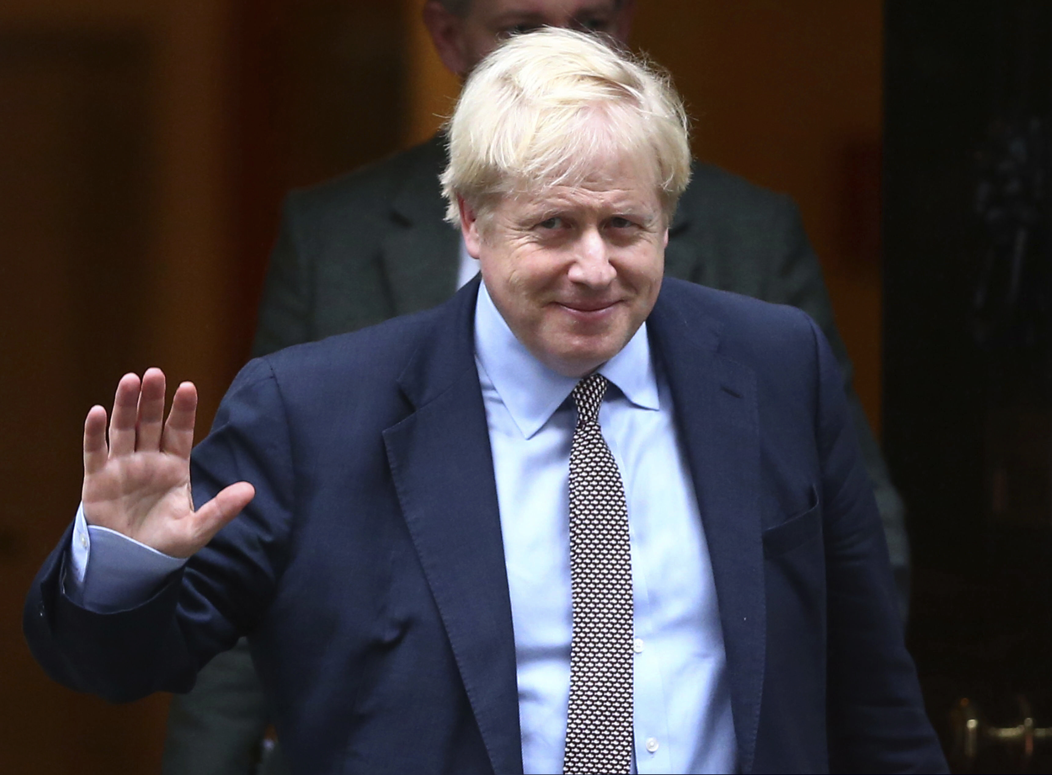 Britain's Prime Minister Boris Johnson leaves 10 Downing Street, on his way to parliament in London, Thursday October 24, 2019. Johnson has announced Thursday that he wants a General Election.