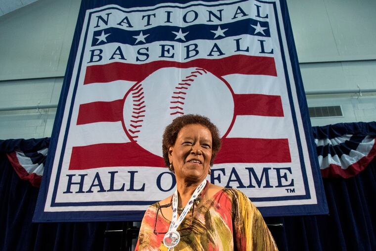 Former Inquirer sports writer and columnist Claire Smith is all smiles as she meets the media in Cooperstown, NY where she will become the first woman to receive the J.G. Taylor Spink Award for her “meritorious contributions to baseball writing.”
