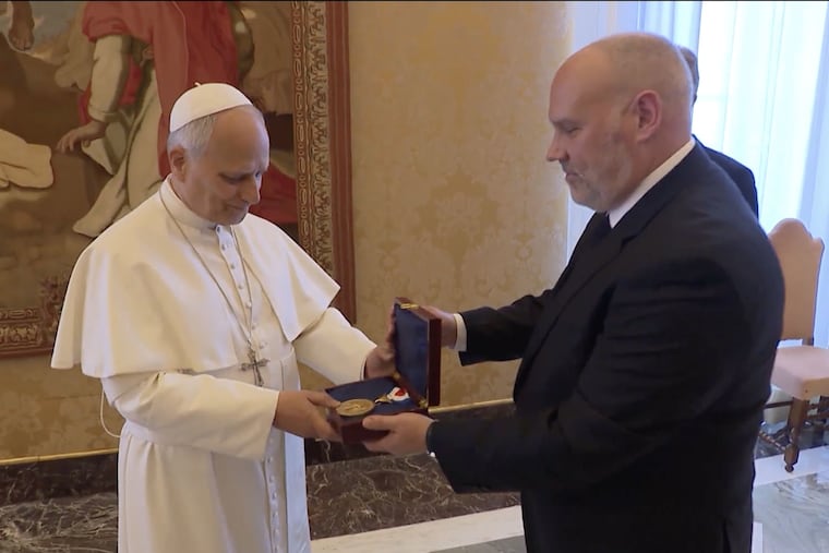 Vince Stango, interim president and CEO of the National Constitution Center, presents Pope Leo XIV with the Liberty Medal ahead of the pontiff's acceptance speech of the award next month on July 3.