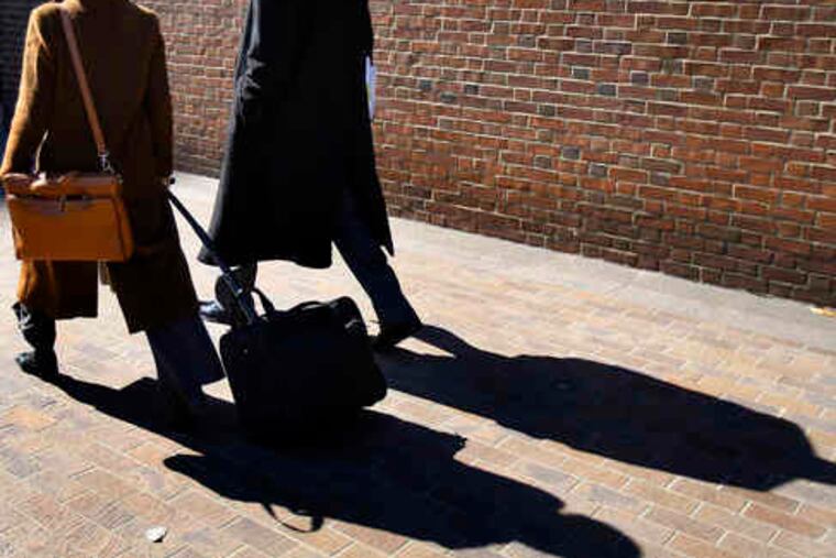 Chris Wright (left), former chief of staff to Councilman Jack Kelly, faces sentencing in May.