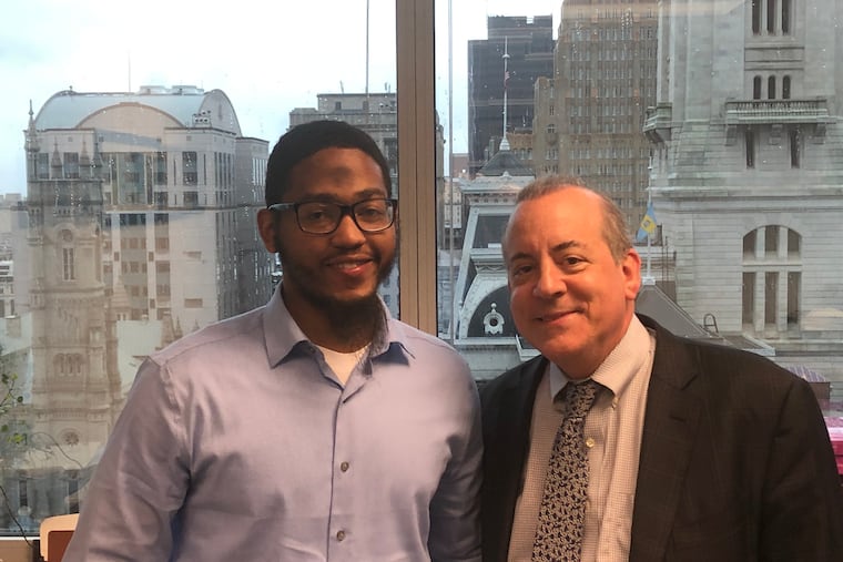 Jabir Kennedy, left, and his lawyer, David Nenner, in Nenner's Center City office Thursday, March 21, 2019. Kennedy was acquitted by a jury after he claimed self-defense in the shootings of four men, one of whom died.