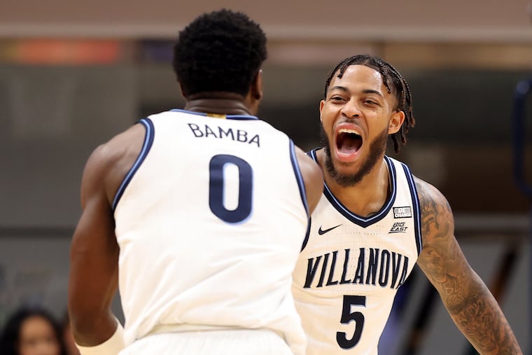 Villanova's T.J. Bamba and Justin Moore celebrate during the first half against Maryland.