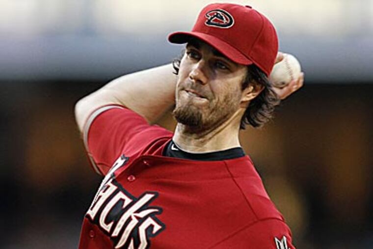 Arizona starter Dan Haren is a potential trade target for the Phillies at the upcoming trade deadline. (AP Photo/Denis Poroy)
