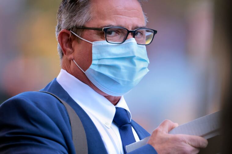 Councilmember Bobby Henon leaves the James A. Byrne United States Courthouse in Philadelphia last month.