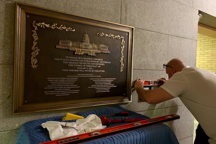 Long-delayed Jan. 6 plaque honoring police installed in Capitol at 4 a.m. Long-delayed Jan. 6 plaque honoring police installed in Capitol at 4 a.m.