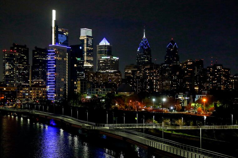 The Philadelphia skyline from the South Street Bridge as the city lights up blue to honor healthcare workers April 7, 2020.