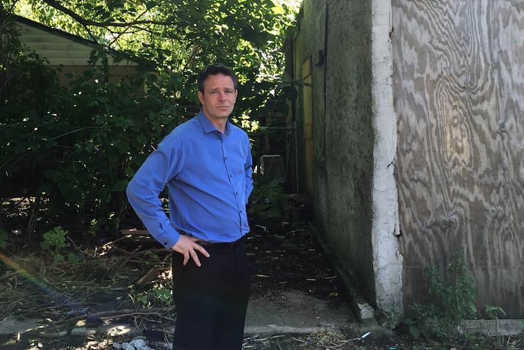 Patrick Duff by the house at 753 Walnut St., where the Rev. Dr. Martin Luther King Jr. King was living when he was refused service at a bar in nearby Maple Shade.