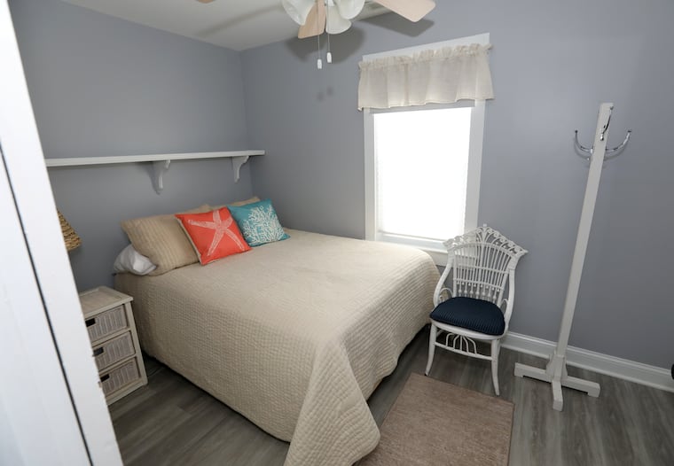 A cozy bedroom in the Wildwood bungalow. 