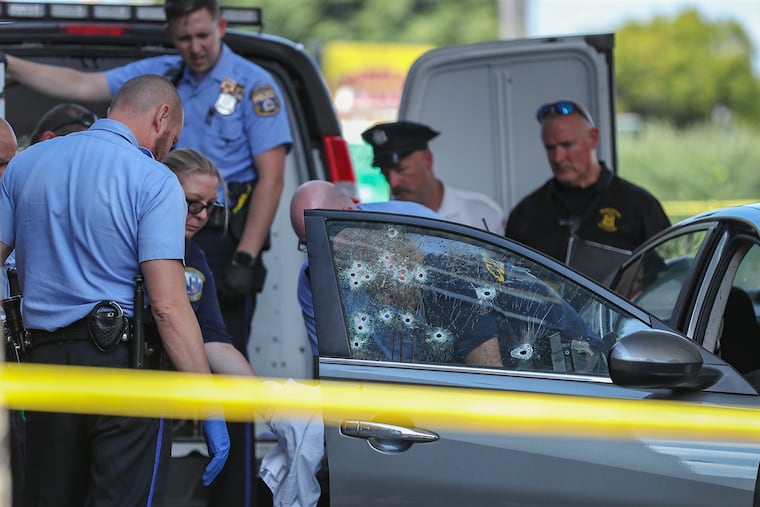 A 38-year-old man died, and a 14-year-old was injured, after two men shot into their car at the Conoco gas station at Broad Street and Lehigh Avenue on Tuesday morning.