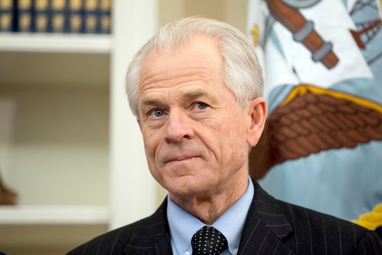 FILE – In this March 31, 2017, file photo, National Trade Council adviser Peter Navarro waits for President Donald Trump at the White House. Navarro and his protectionist trade policies are on the rise. (AP Photo/Andrew Harnik, File)