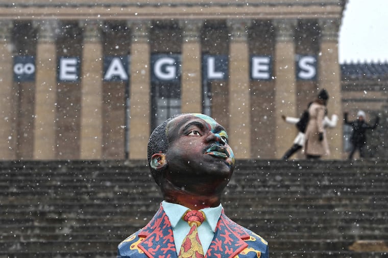 A Martin Luther King Jr. bust for Black History Month and a "Go Eagles" banner for the Super Bowl decorate the front steps of the Philadelphia Museum of Art Tuesday, January 30, 2018.