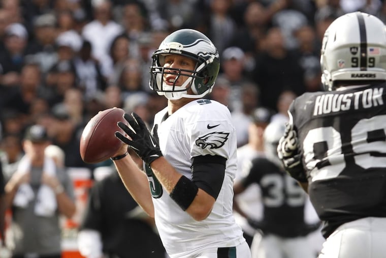 Nick Foles prepares to throw one of his seven touchdown passes against the Raiders in 2013.