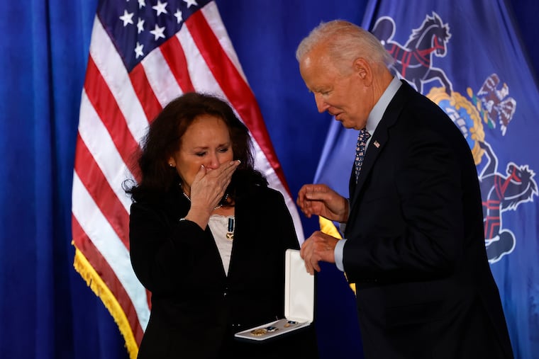 President Joe Biden presents Rita Lewis the Presidential Citizens Medal during the Sprinkler Fitters Local Union 692 in Northeast Philadelphia on Friday, November 1, 2024. Lewis is the widow of the Butch Lewis, a Teamster who was the namesake of the Butch Lewis Act.