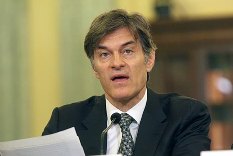 Dr. Mehmet C. Oz, chairman and Professor of Surgery, Columbia University College of Physicians and Surgeons, testifies on Capitol Hill in Washington, Tuesday, June 17, 2014 , before the Senate subcommittee on Consumer Protection, Product Safety, and Insurance hearing to examine protecting consumers from false and deceptive advertising of weight-loss products. (AP Photo/Lauren Victoria Burke)