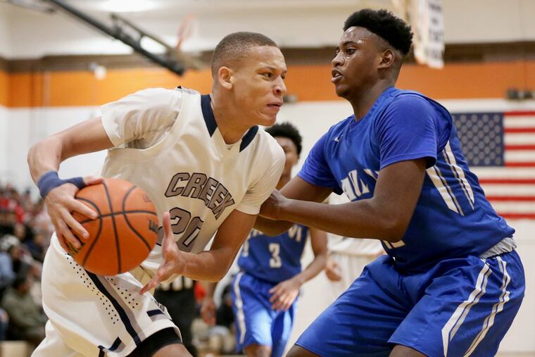 Timber Creek’s Isaiah Sanders (left) scored 17 points on Saturday.