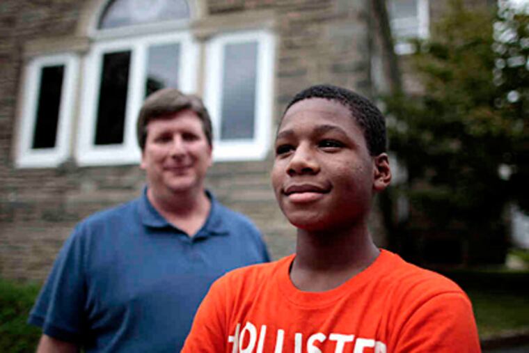 Wyncote Academy student Nadin Khoury with principal Kirk Hiltinger. (David Swanson / Staff Photographer)
