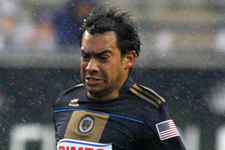 Carlos Ruiz is one of an increased number of Union players to take a chance at scoring from a distance. (AP Photo)