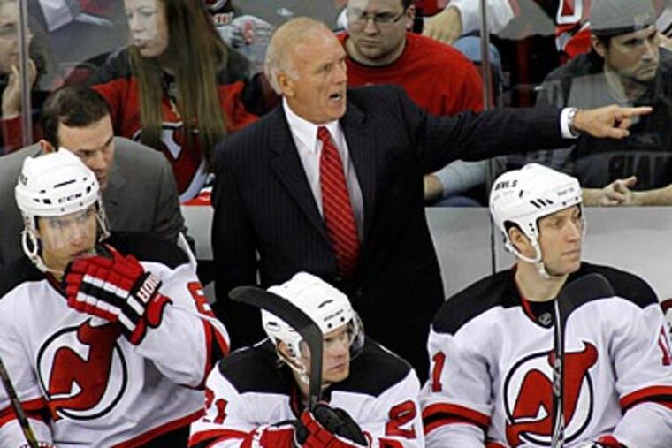Jacques Lemaire and the Devils visit the Wells Fargo Center Saturday afternoon to play the Flyers. (AP file photo)