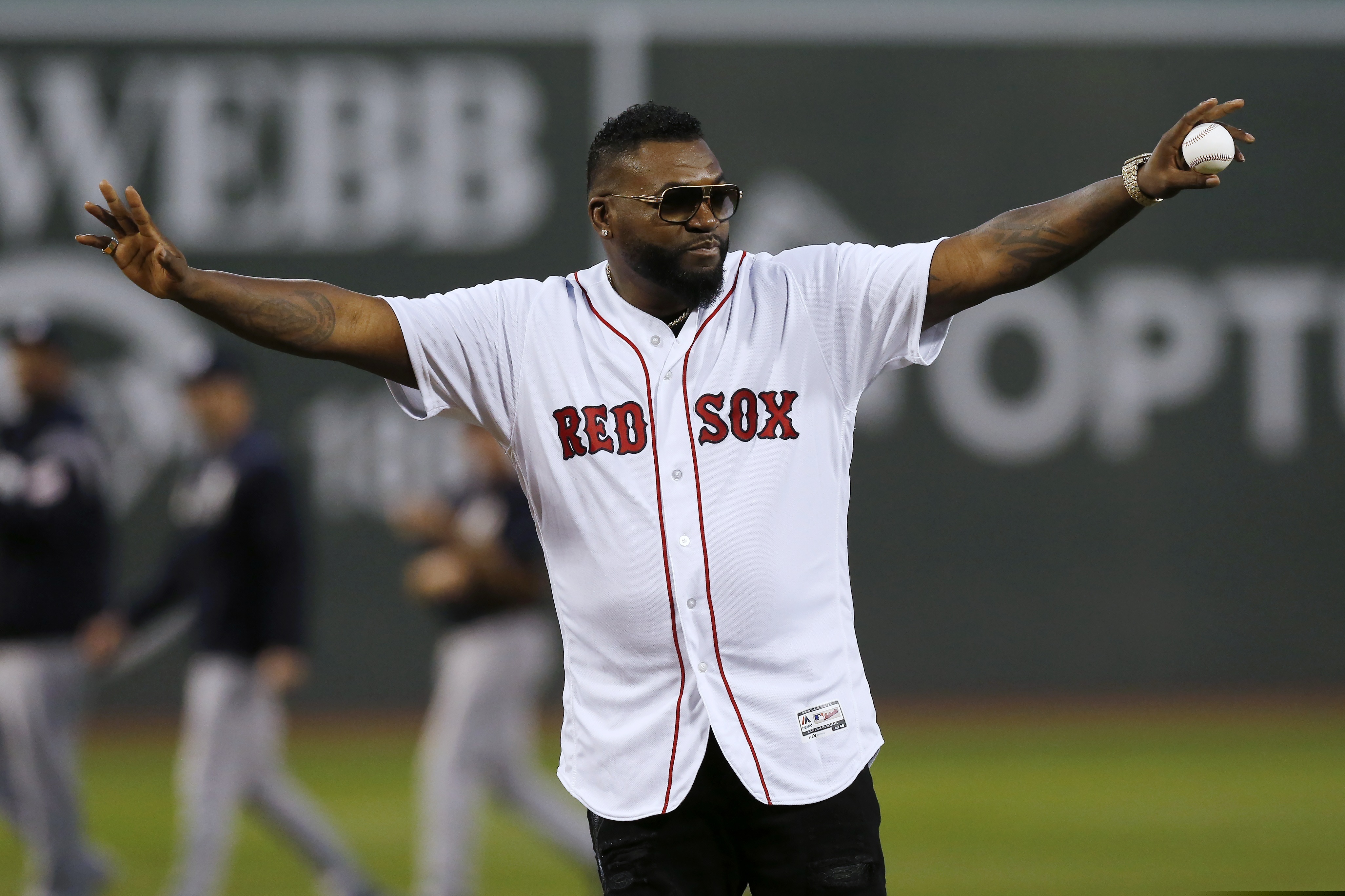 Former Boston Red Sox's David Ortiz gets ready to throw out a ceremonial first pitch before a baseball game against the New York Yankees in Boston in 2019.