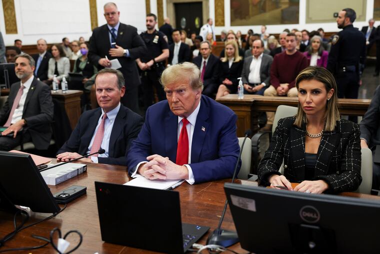 Former President Donald Trump, with lawyers Christopher Kise and Alina Habba, attends the closing arguments in the Trump Organization civil fraud trial on Jan. 11, 2024.