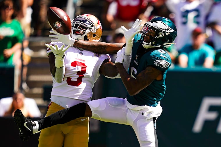 San Francisco 49ers strong safety Jaquiski Tartt (3) keeps the Eagles' DeVonta Smith from hauling in a pass on Sept. 19, 2021.