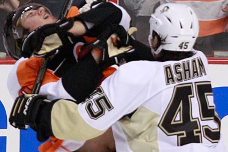 Arron Asham received a match penalty for a hit on Brayden Schenn in the first period of Game 3. (Ron Cortes/Staff Photographer)