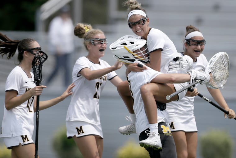 Moorestown, shown celebrating during the NJSIAA Group 3 girls' lacrosse championship game against Mendham last Saturday, beat Ridgewood, 11-10, on Wednesday to advance to the Tournament of Champions final.