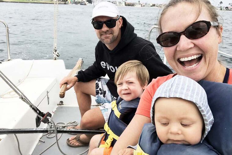 Michael and Kirsten Sebright with their children Liam (left) and James. MICHAEL SEBRIGHT