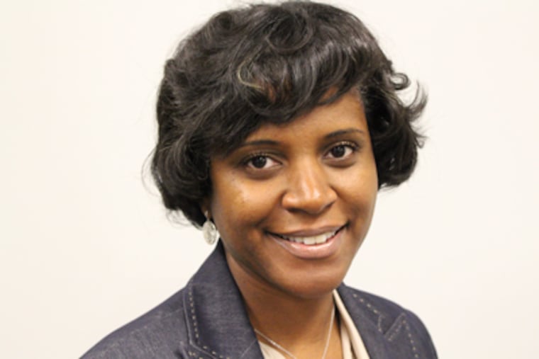 Velvet McNeil stormed out of the New Jersey DMV office because they would not allow allow her to smile for her license photo, Wednesday, September 19, 2012. ( Jessica Griffin/ Staff Photographer )