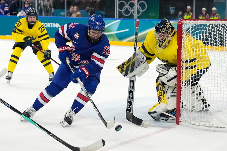 The U.S. team's Tessa Janecke closes in on Sweden goalie Ebba Svensson Traff during the Olympic hockey semifinal on Feb. 16.