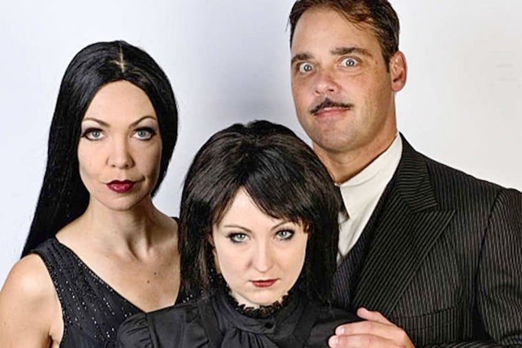 Jennie Eisenhower and Jeff Coon go goth as Gomez and Morticia, with Lauren Cupples as Wednesday, in "The Addams Family" at the Media Theatre.