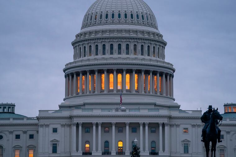 The Capitol is seen under early morning gray skies in Washington, Thursday, Dec. 20, 2018.