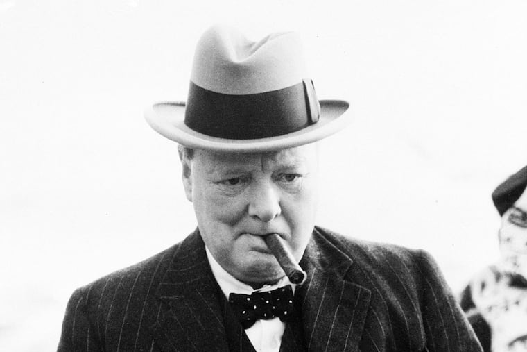 As this Aug. 23, 1939 photo shows, Winston Churchill enjoyed a good cigar.