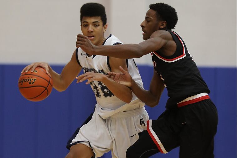Matt Dade during the 2016 season, driving against Archbishop Ryan's Izaiah Brockington.