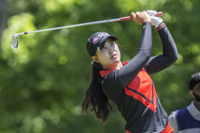 Pajaree Anannarukarn watches her ball flight after her tee shot to the par 3, 17th green during the Valley Forge Invitational Golf Tournament held at Ravens Claw Golf Club on Thursday.
