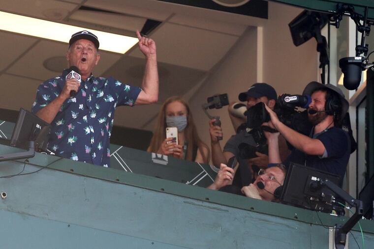 Bill Murray sings during the seventh inning stretch of a game between the Chicago Cubs and the St. Louis Cardinals at Wrigley Field in Chicago on June 11, 2021.