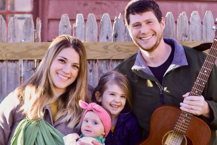 Sarah and Ben with daughters Martha (left) and Lucy.