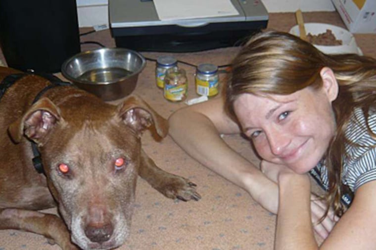 Michele Pich and Cleopatra, who, despite intensive treatment, died of lymphoma. Afterward, Pich became the full-time veterinary grief counselor at Penn's Ryan Veterinary Hospital.