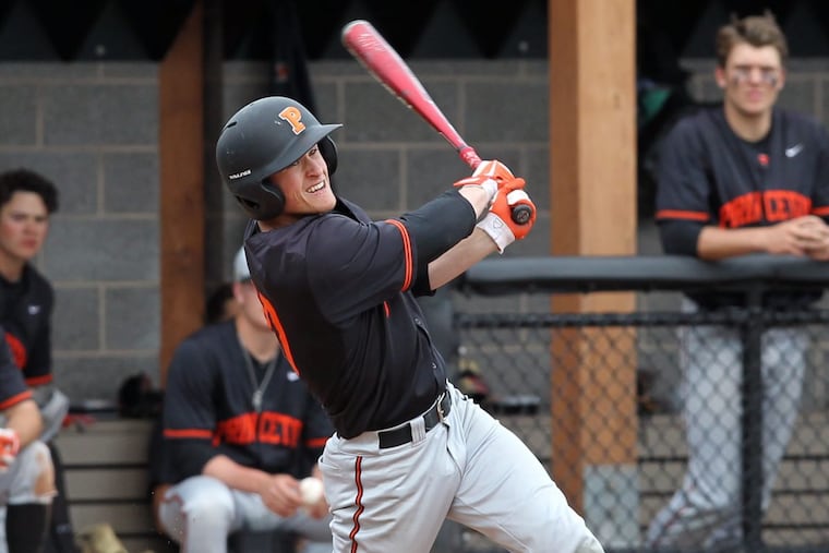 Jake Boone bats against Harvard.