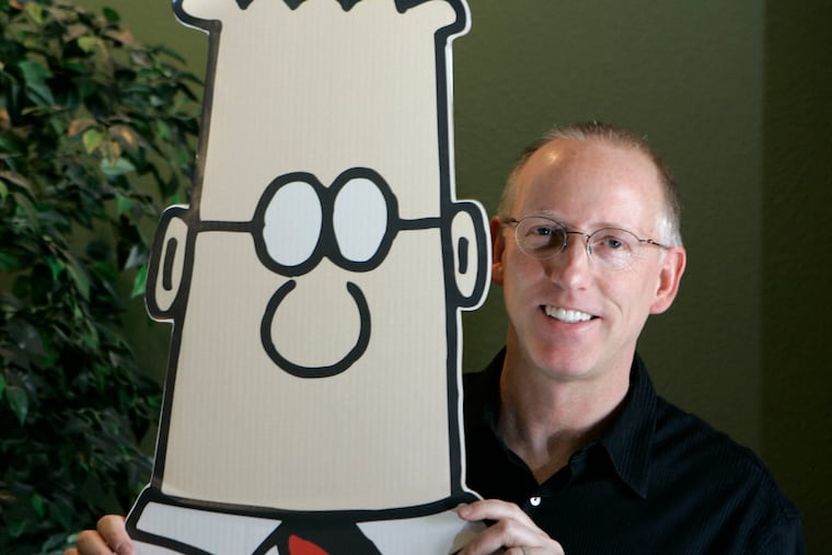 Scott Adams, creator of the comic strip "Dilbert," posing for a portrait with the Dilbert character in his studio in Dublin, Calif., on Oct. 26, 2006. Several prominent media publishers across the U.S. are dropping the "Dilbert" comic strip after Adams, its creator, described people who are Black as members of “a racist hate group” during an online video show.