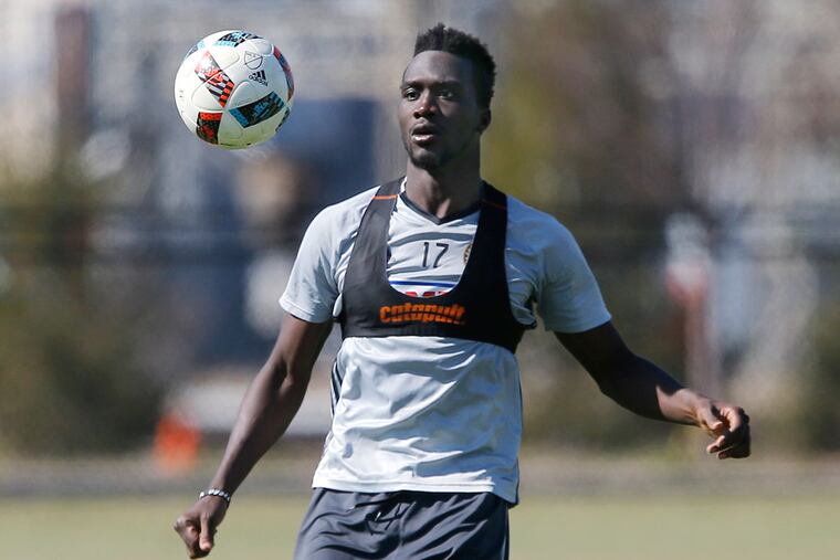 The Union's C.J. Sapong works on his ballhandling skills after Tuesday's practice at the Union's facility in Chester.
