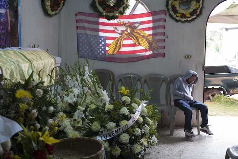 A boy attends the June 1 wake of slain Guatemalan immigrant Claudia Gomez Gonzalez at her parent's home in San Juan Ostuncalco, Guatemala. The 19-year-old, who was fatally shot by a U.S. Border Patrol agent in Texas on May 23, had graduated as a forensic accountant but was unable to attend college or find a job, so she had left Guatemala for the U.S., according to her aunt.