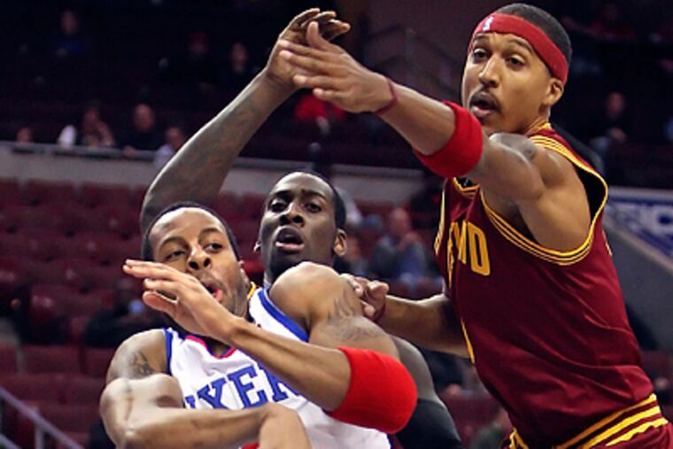 Andre Iguodala left Friday's game with a strained right Achilles tendon. (Steven M. Falk / Staff Photographer)